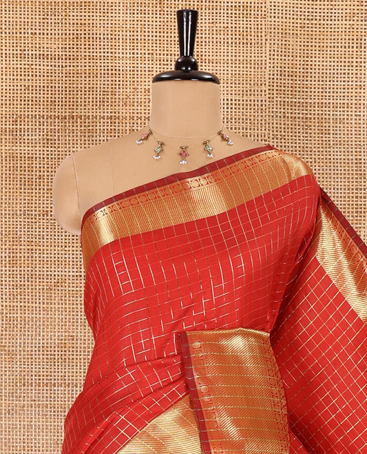 Red zari checked semi-katan silk saree, traditional zari border, zari-rich pallu, and a matching blouse