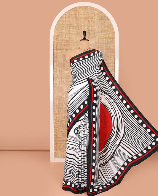 White and black horizontal stripes and wavy patterned crepe silk saree, small coin buttas printed blouse, big circle motifs printed pallu, and a plain blouse