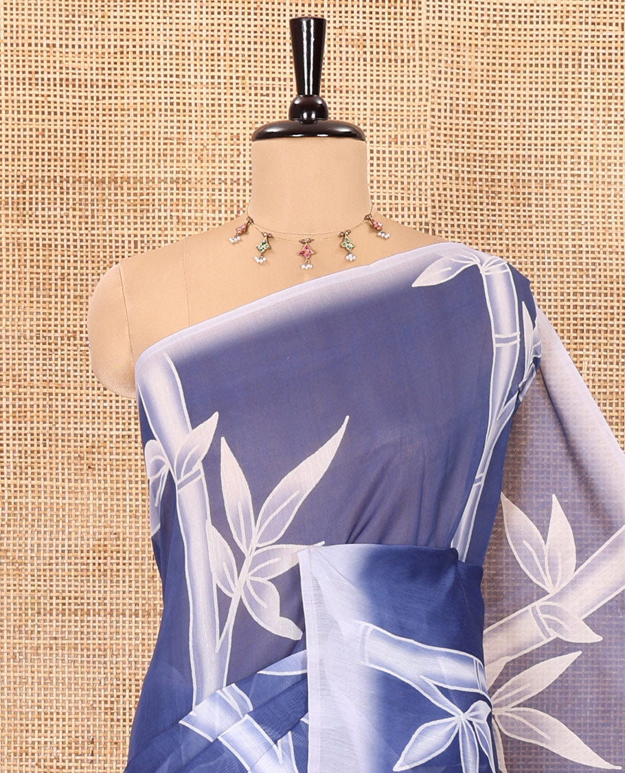 Blue bamboo motifs printed chanderi cotton saree, contrast plain border, bamboo motifs printed pallu, and a contrast unique motifs printed blouse
