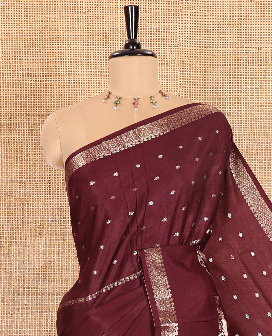 Wine Russian Silk Saree Adorned with Gold Zari Buttas and Deer Motifs, Featuring a Subtly Sparkling Traditional Zari Border, a Pallu with Zari Stripes, and a Contrast Blouse Woven with Peacock Meena Buttas
