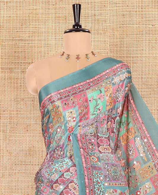 Pista Masakali Saree Featuring Floral and Mughal-Style Motifs Print and Mirror Work, Self-Printed Border, Pallu Decked Up with Colorful Mughal-Inspired Motifs Print, and a Matching Printed Blouse