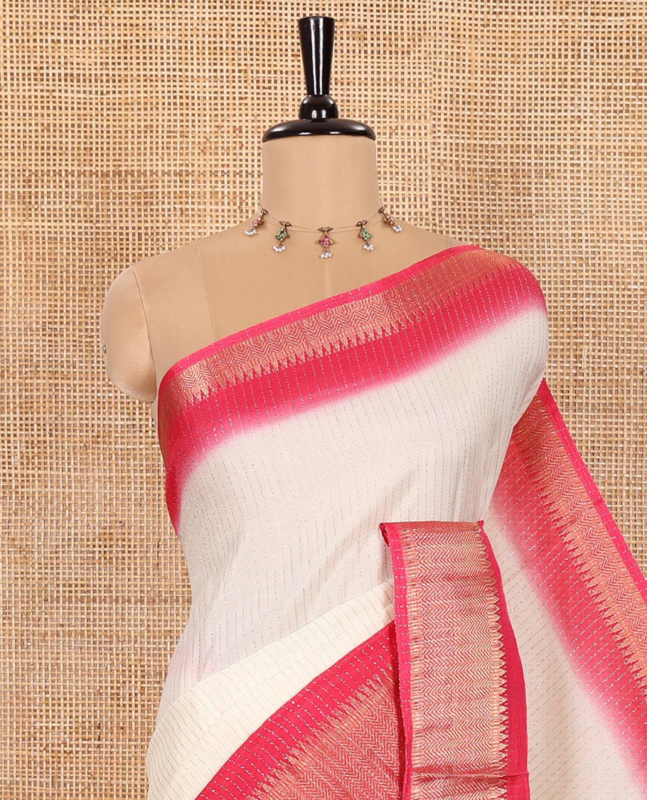Half-White Dola Silk Saree Adorned with Vertical Golden Stripes Running All Over Its Body, Complemented by a Contrast Traditional Zari Design Woven Border, Subtly Striped Pallu, and a Contrast Buttas Woven Blouse