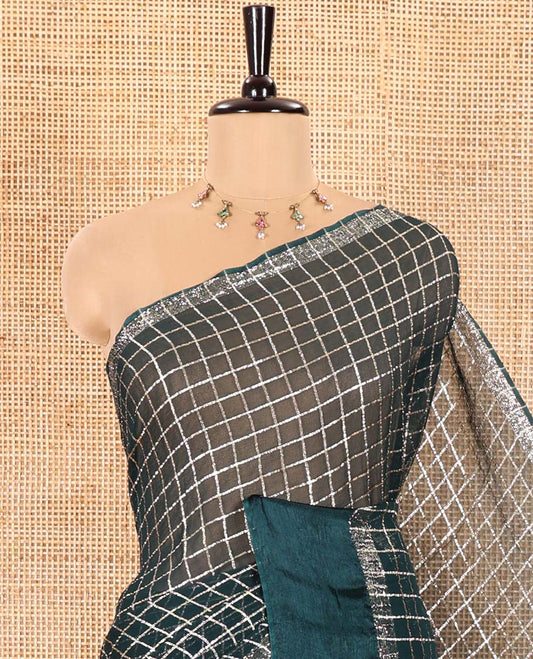 Peacock Green Viscose Georgette Saree Gleamed with Golden Zari Checks All Over Its Body, Adorned with a Satin Plain Border, a Self Pallu Featuring the Same Checks, and Paired with a Running Blouse