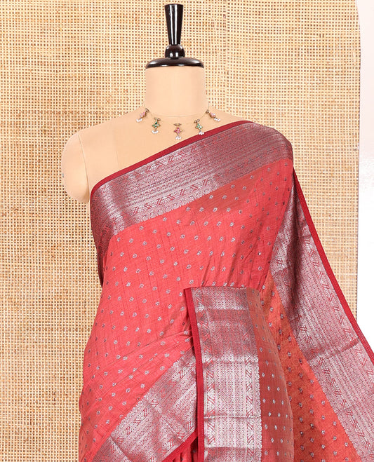 Maroon Semi Tussar Saree Elevated with Zari Buttas All Over the Body, a Hazily Woven Border of Traditional Designs, Pallu Steeped with Zari Buttas and Zari Stripes, and Paired with a Matching Blouse