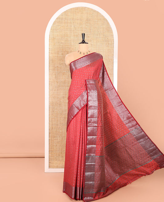 Maroon Semi Tussar Saree Elevated with Zari Buttas All Over the Body, a Hazily Woven Border of Traditional Designs, Pallu Steeped with Zari Buttas and Zari Stripes, and Paired with a Matching Blouse