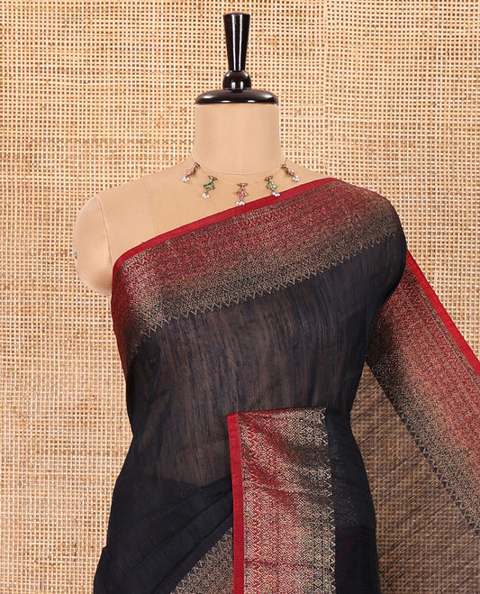 Black Plain Jute Linen Saree, Complemented by a Contrast Hazily Woven Border of Traditional Designs, Subtly Striped Pallu, and Paired with a Contrast Blouse