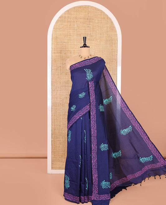 Blue South Cotton Saree Featuring Pretty Peacock Paisley Motifs Block Printed All Over Its Body, Subtly Floral Printed Border, and Comes with One Matching Blouse, and One Contrast Patola Printed Blouse
