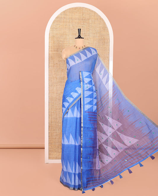 Royal Blue Linen Saree Adorned with Triangle Patterns Print, and Mirror Work All Over Its Body, Subtle Zari Piping Border, Contrast Pallu Mirrors the Same Print, and Paired with a Printed Blouse