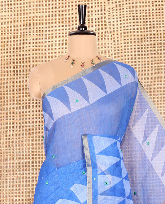 Royal Blue Linen Saree Adorned with Triangle Patterns Print, and Mirror Work All Over Its Body, Subtle Zari Piping Border, Contrast Pallu Mirrors the Same Print, and Paired with a Printed Blouse