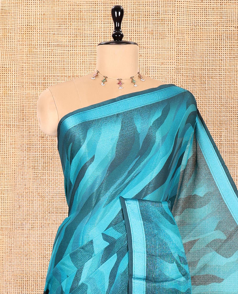 Blue Shimmer Chiffon Saree, Uniquely Printed with Abstract-Style Animal-Skin Texture Print All Over Its Body, Subtle Satin Piping Border, Pallu Mirrors the Same Print, and Paired with a Matching Blouse
