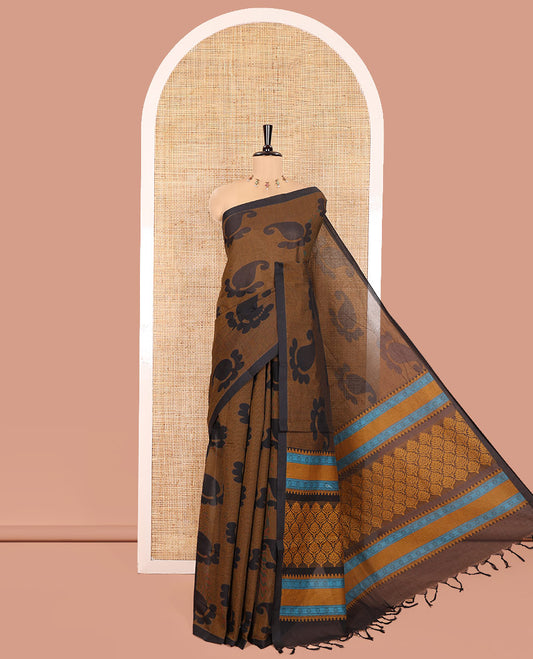 Borderless Black-Brown Coimbatore Cotton Saree, Adorned with Paisley Motifs Printed on Its Body, Pallu Intricately Printed with Geometric Motifs, and Paired with a Matching Blouse