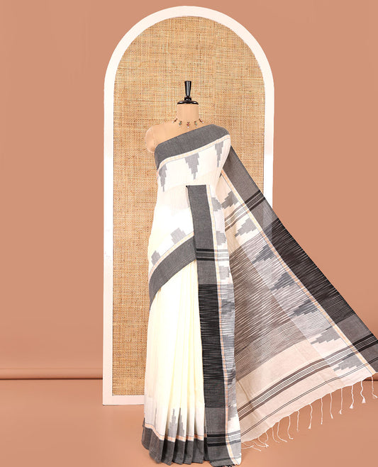 Off-white Plain Khadi Mul Cotton Saree, Complemented by a Contrast Temple Border, Textured Pallu of Temple Designs, and Paired with a Matching Blouse