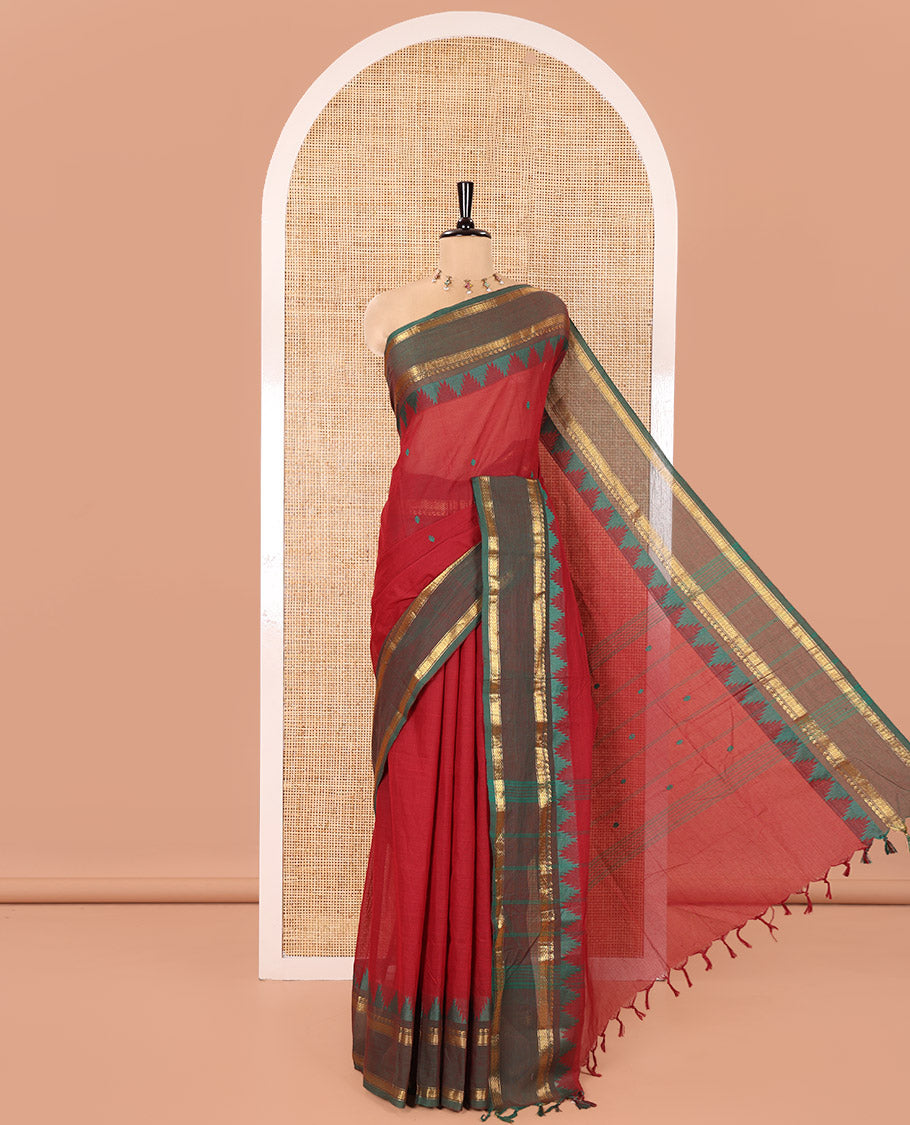 Maroon Chettinad Cotton Saree, Subtly Sparkled with Thread Buttas All Over Its Body, Complemented by a Contrast Border Rettai Pettu Border of Paisley and Chevron Stripes, Subtly Designed Pallu, and Paired with a Matching Blouse