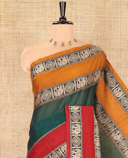 Green Plain Mercerised Cotton Saree, Complemented by a Contrast Ganga-Jamuna Rettai Pettu Thread Border of Temple, Elephant, and Chakram Designs, Subtly Striped Pallu, and Paired with a Matching Blouse