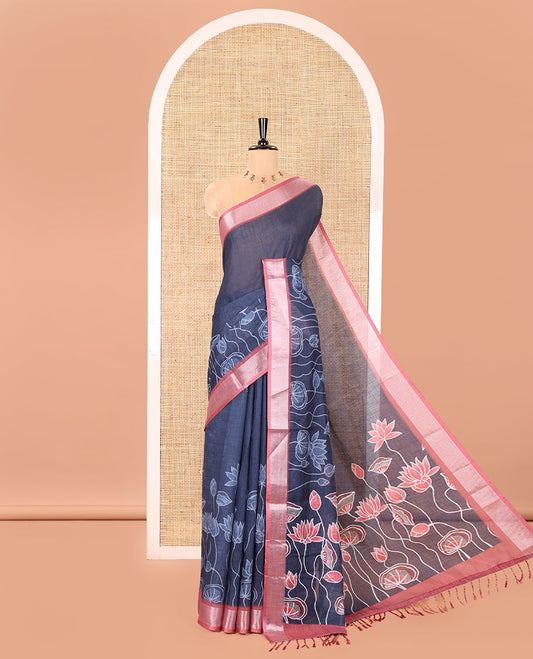 Blue Linen Cotton Saree, Artfully Detailed with Pichwai Lotus Motifs Printed on Its Body, Complemented by a Contrast Bavanji Border, Pallu Pictures Pichwai Lotus Motifs, and Paired with a Contrast Blouse