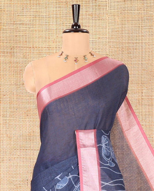 Blue Linen Cotton Saree, Artfully Detailed with Pichwai Lotus Motifs Printed on Its Body, Complemented by a Contrast Bavanji Border, Pallu Pictures Pichwai Lotus Motifs, and Paired with a Contrast Blouse