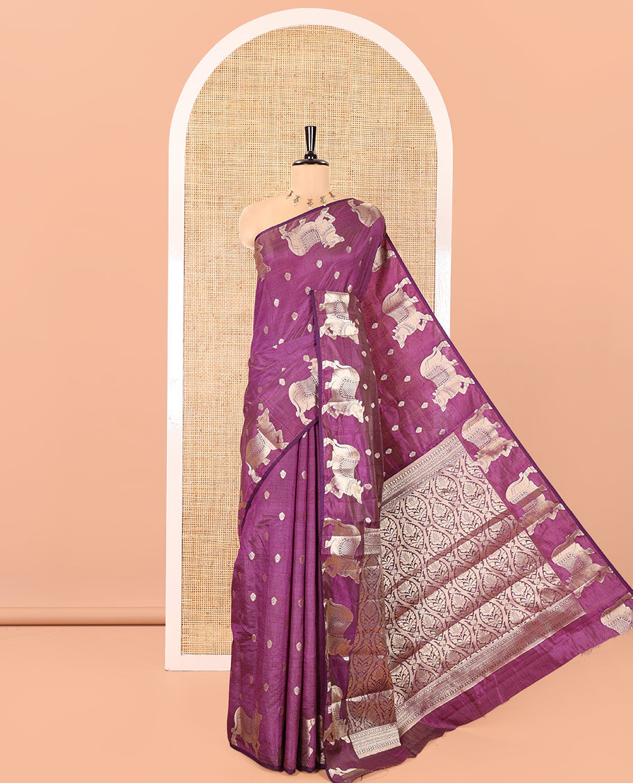 Violet Art Tussar Saree, Delicately Woven with Gold Zari Buttas All Over Its Body, Highlighted by a Zari Border of Pichwai Cow Motifs, Grandly Woven Pallu, and Paired with a Matching Blouse