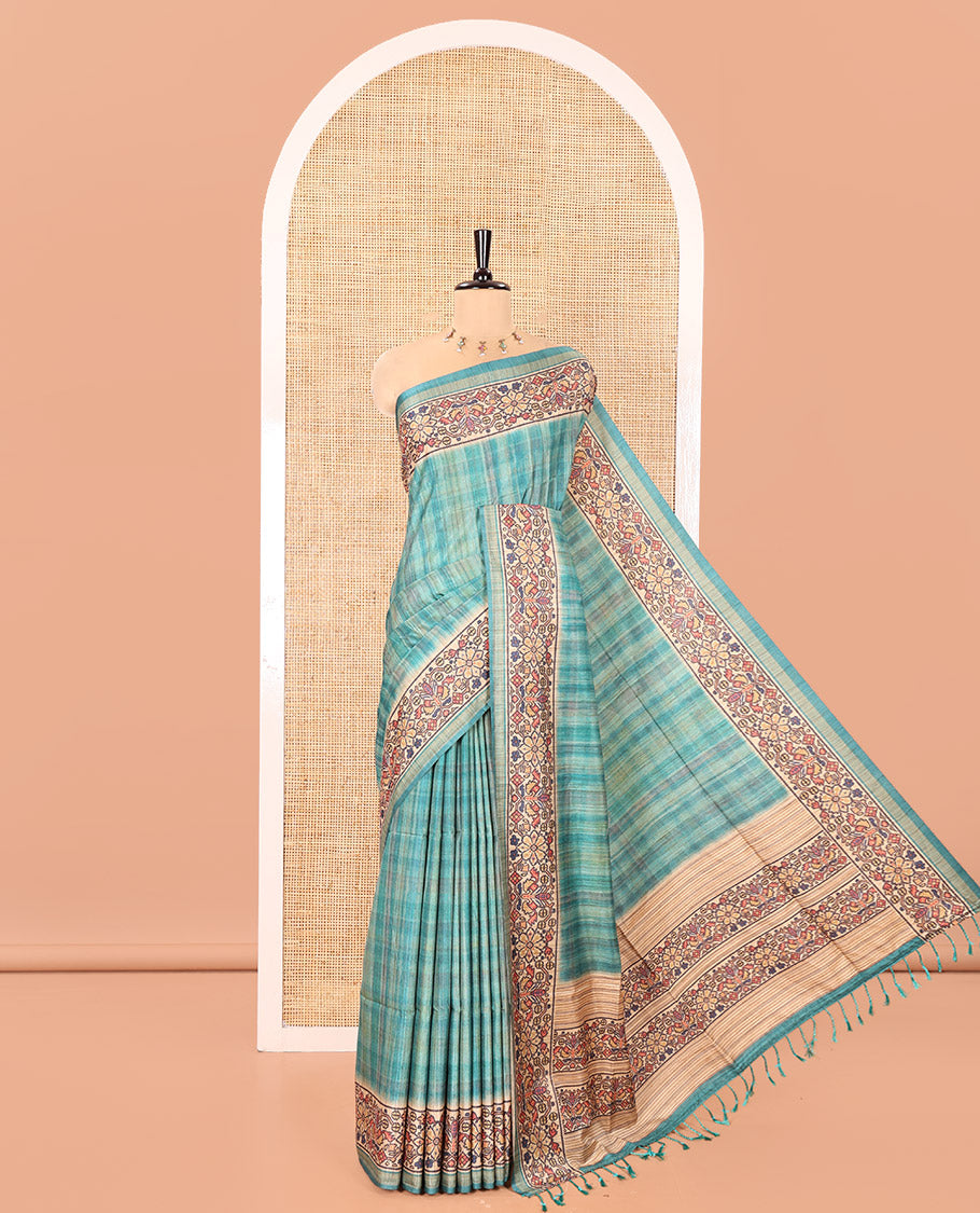 Rama Katan Silk Saree, Embellished with Checked Design On Its Body, Artfully Designed Madhubani Painting Theme Border, Pallu of Same Madhubani Print, and Paired with a Madhubani Printed Blouse