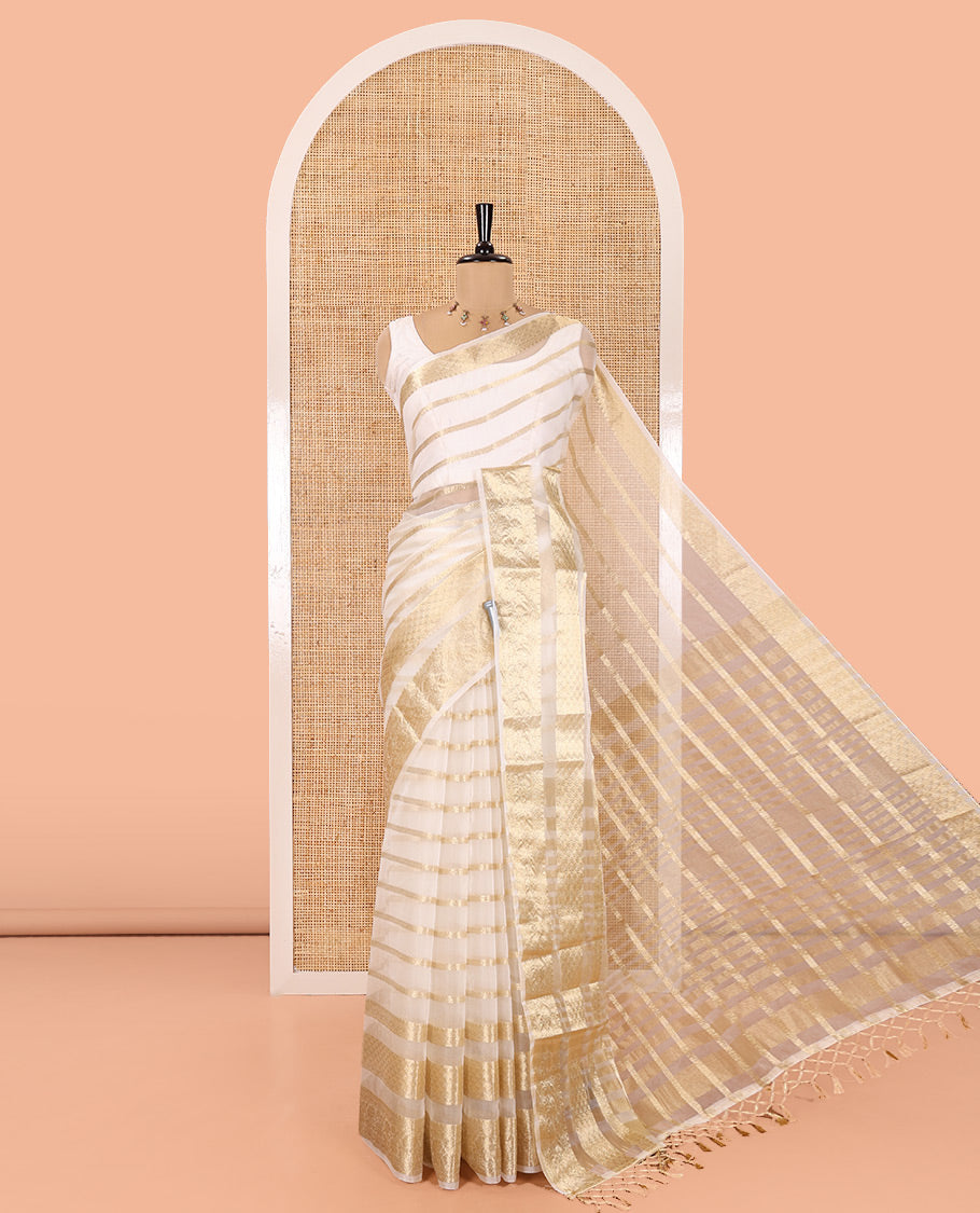 Cream Semi-Organza Saree, Steeped in Richness of Horizontal Zari Stripes All Over Its Body, Highlighted by a Traditional Zari Design Border, Gleaming Zari Design Pallu, and Paired with a Matching Blouse