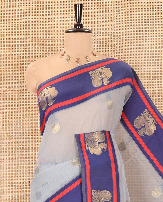 Grey Chanderi Cotton Saree, Woven with Zari Buttas All Over Its Body, Complemented by Contrast Border of Peacock Designs, Grand Jaal Pallu, and Paired with a Matching Blouse