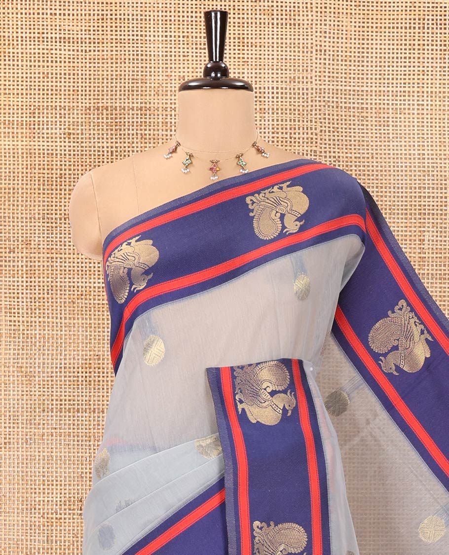 Grey Chanderi Cotton Saree, Woven with Zari Buttas All Over Its Body, Complemented by Contrast Border of Peacock Designs, Grand Jaal Pallu, and Paired with a Matching Blouse