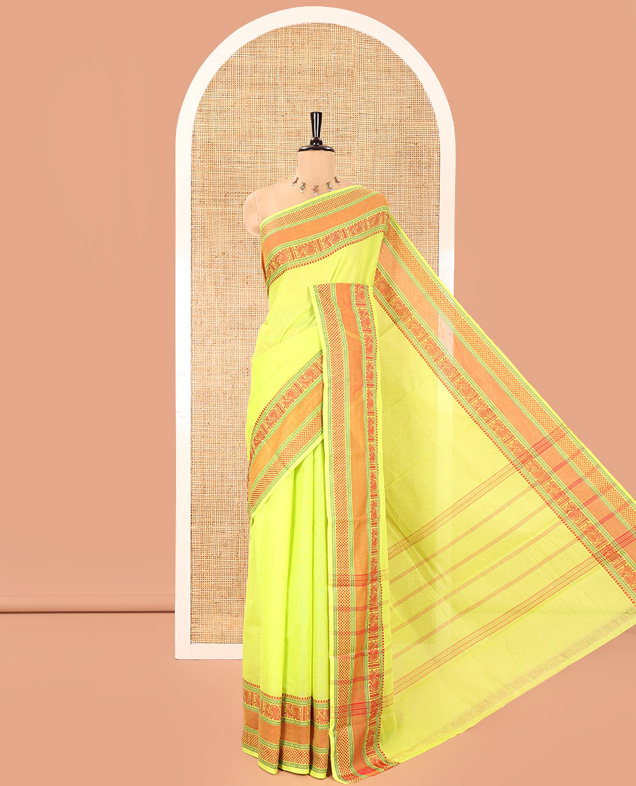 Leaf Green Plain Chettinad Cotton Saree, Delicately Decked Up with Traditional Thread Border Featuring Peacock and Ara Maadam Designs, Subtly Striped Pallu, and Paired with a Matching Blouse