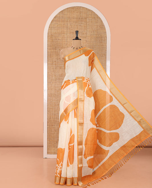 Cream Linen Cotton Saree, Beautified with Floral Print All Over Its Body, Complemented by a Contrast Zari Bavanji Border, Floral Printed Pallu, and Paired with a Matching Blouse