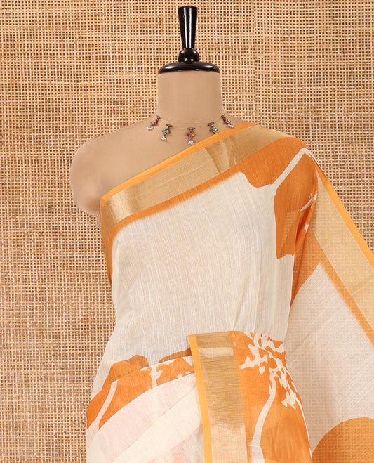Cream Linen Cotton Saree, Beautified with Floral Print All Over Its Body, Complemented by a Contrast Zari Bavanji Border, Floral Printed Pallu, and Paired with a Matching Blouse