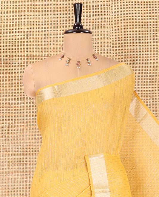 Yellow Linen Zari Cotton Saree, Gleamed Up with Zari Stripes All Over Its Body, a Subtle Zari Border, a Self-Pallu, and Comes Without a Blouse