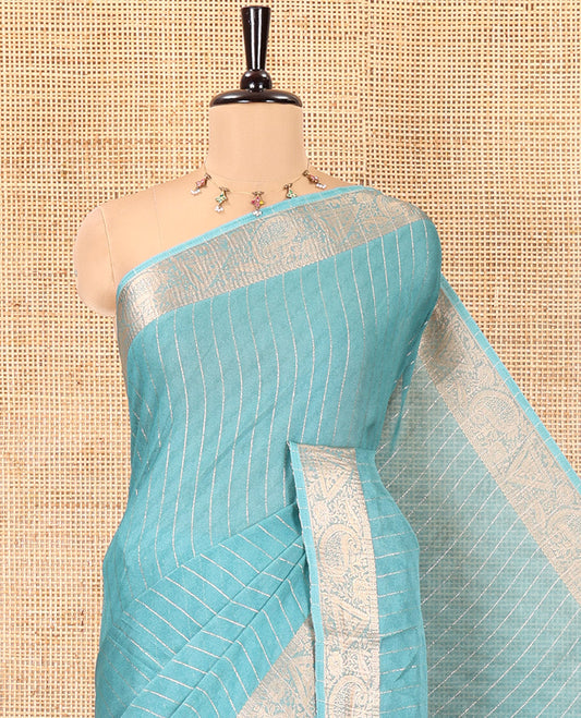 Blue Moss Chiffon Saree, Gleamed Up with Vertical Stripes, a Zari Paisley-Diamond Border, and a Matching Blouse
