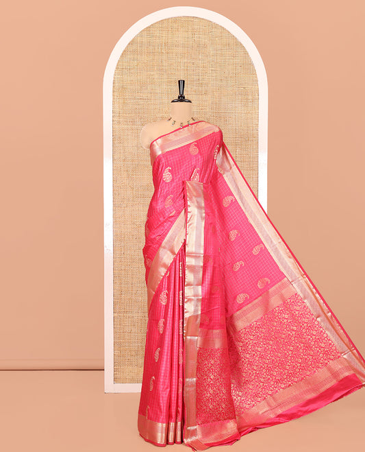 Rani Pink Satin Silk Saree, Enriched with Paisleys and Zari Checked Design on Its Body, Highlighted by Zari Traditional Design Border, Floral Jaal Pallu, and Paired with a Matching Blouse