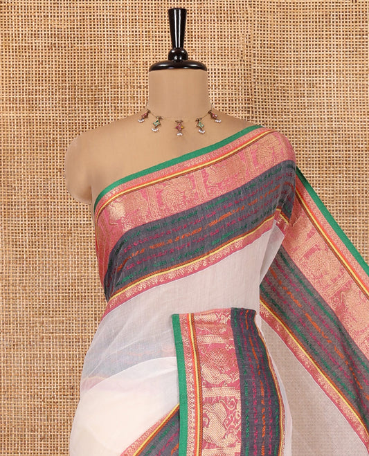 Cream Khadi Mul Cotton Saree, Adorned with Contrast Traditional Yaali-Peacock Border and a Matching Blouse