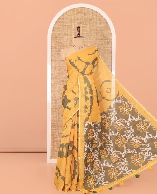 Mustard Linen Cotton Saree, Adorned with Shibori Print, Gold Piping Border, Contrast Floral Printed Pallu, and Contrast Floral Printed Blouse