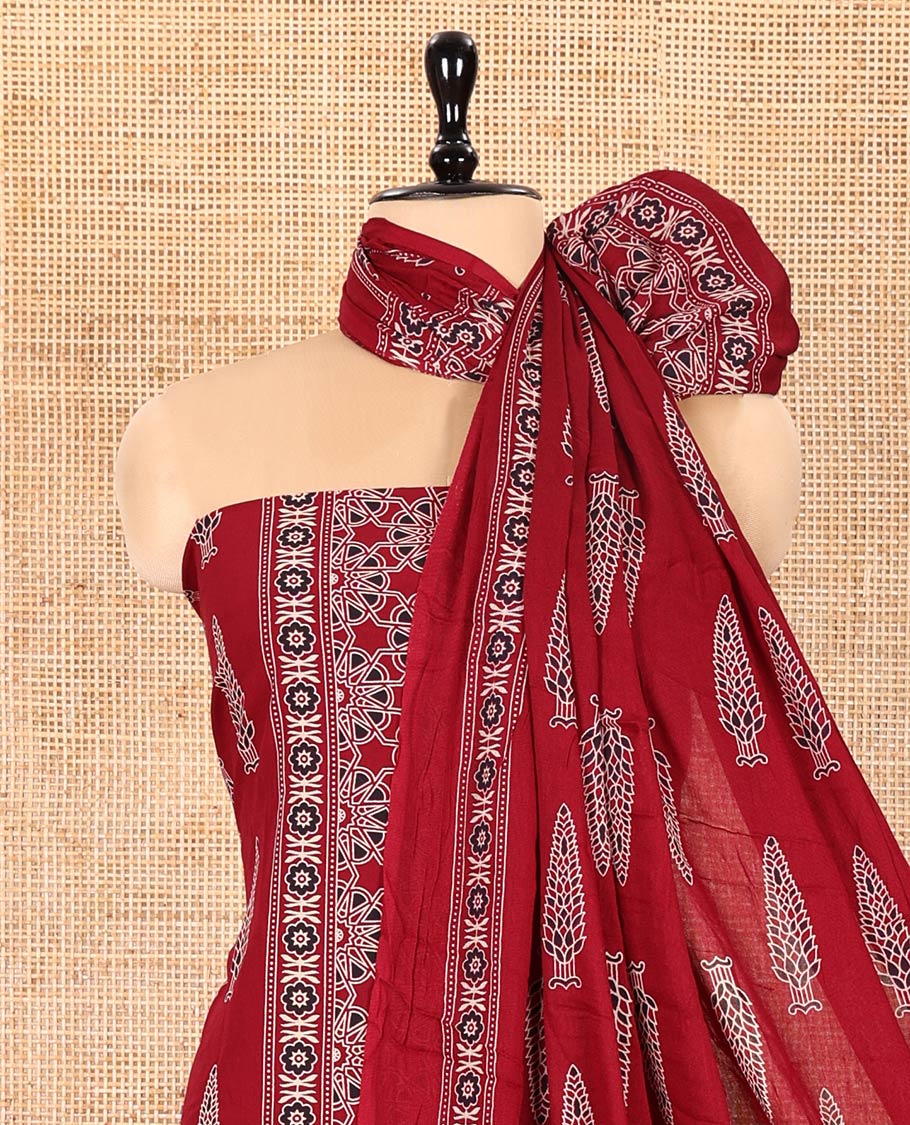 Maroon Rayon Material Chudidhar Set, Bedecked with Ajrakh-Style Floral Printed Top, Elegantly Printed Bottom, and Rayon Dupatta of Ajrakh-Style Floral and Tree Motifs Print