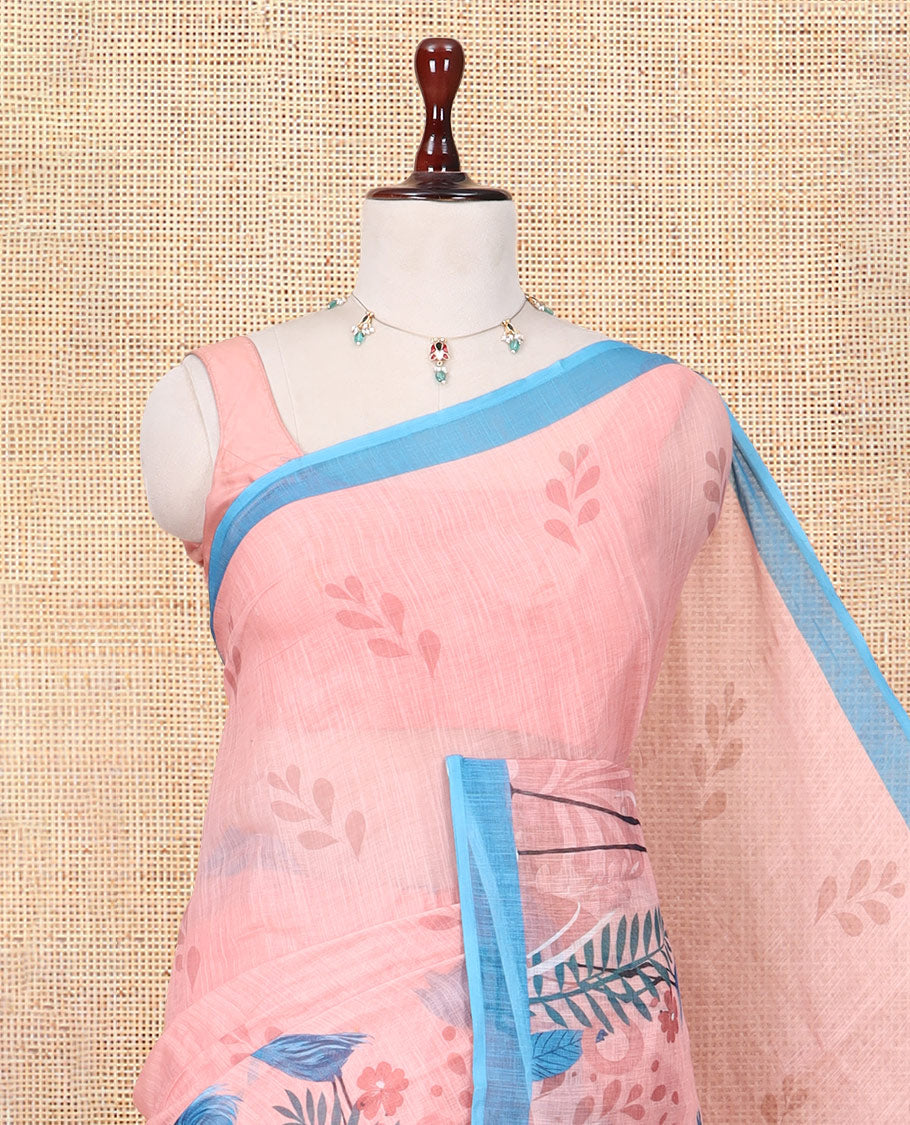 Peach Linen Cotton Saree, Elevated with Floral Crane Motifs Print, a Contrast Border, and a Contrast Blouse