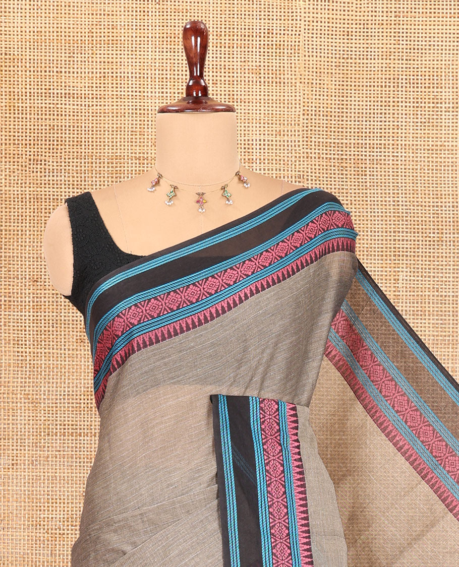 Grey Plain Chettinad Cotton Saree, a Contrast Traditional Thread Border, and a Contrast Blouse
