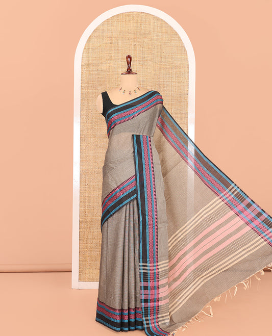 Grey Plain Chettinad Cotton Saree, a Contrast Traditional Thread Border, and a Contrast Blouse