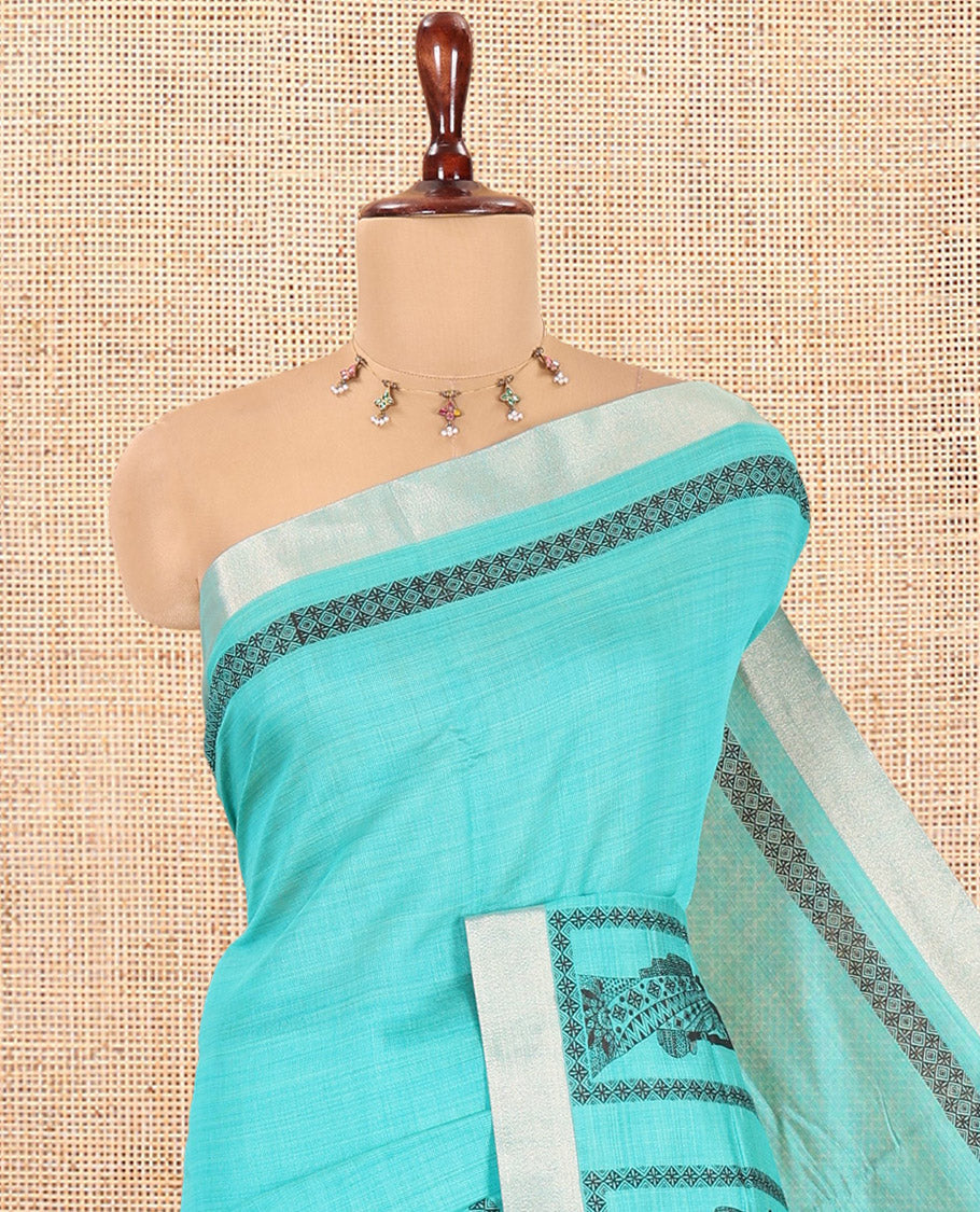 Sea Green Semi-Katan Silk Saree, Adorned with Human Figurine, Copper Zari Border, Contrast Warli Pallu, and a Contrast Blouse