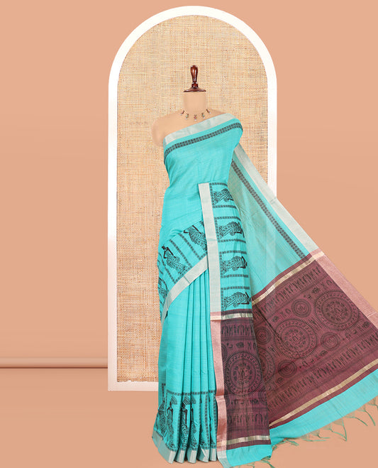 Sea Green Semi-Katan Silk Saree, Adorned with Human Figurine, Copper Zari Border, Contrast Warli Pallu, and a Contrast Blouse