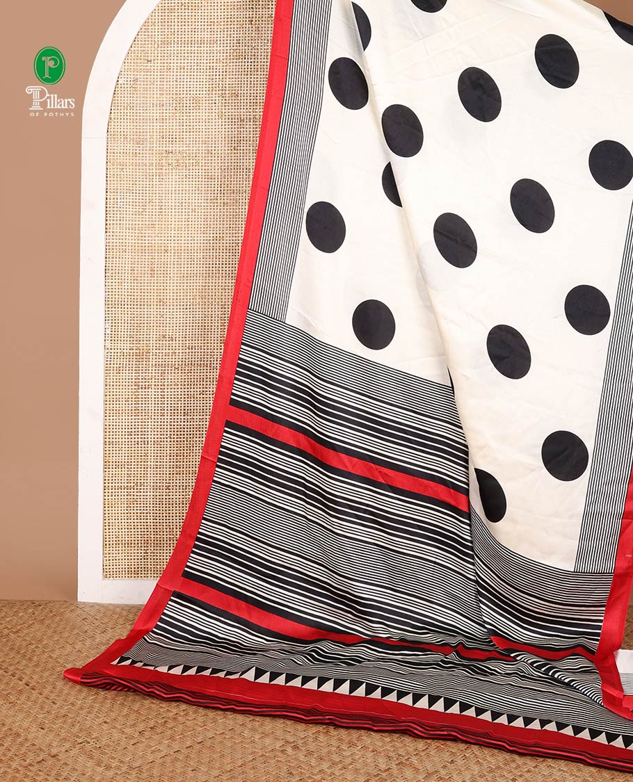 Cream with red  polka dot printed design gajji silk saree with contrast piping border & printed pallu along with striped blouse