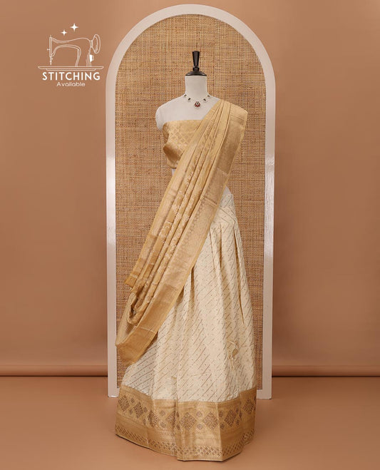 Cream semi-banaras material chudidar,leheriya zari skirt,contrast gold-color zari & swarovski stonework border,jacquard blouse & zari weave dhavani