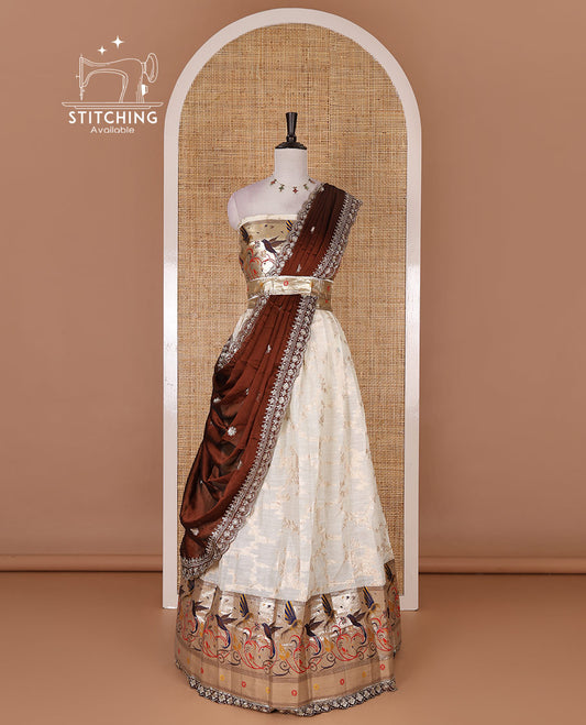 Cream banaras halfsaree, jaal jacquard skirt, contrast wine paithani border, matching blouse, and Syska georgette embroidered dhavani