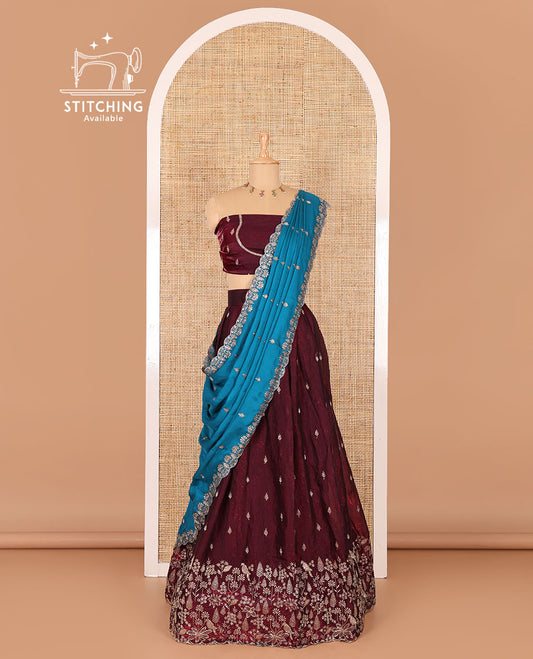 Wine half-saree, floral and bird motifs embroidered velvet organza top, matching embroidered blouse, and contrast scallop embroidered syska georgette dhavani