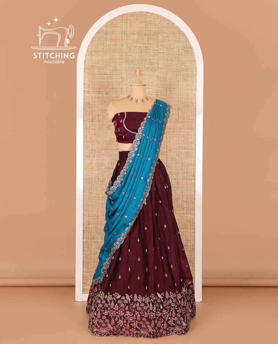 Wine half-saree, floral and bird motifs embroidered velvet organza top, matching embroidered blouse, and contrast scallop embroidered syska georgette dhavani