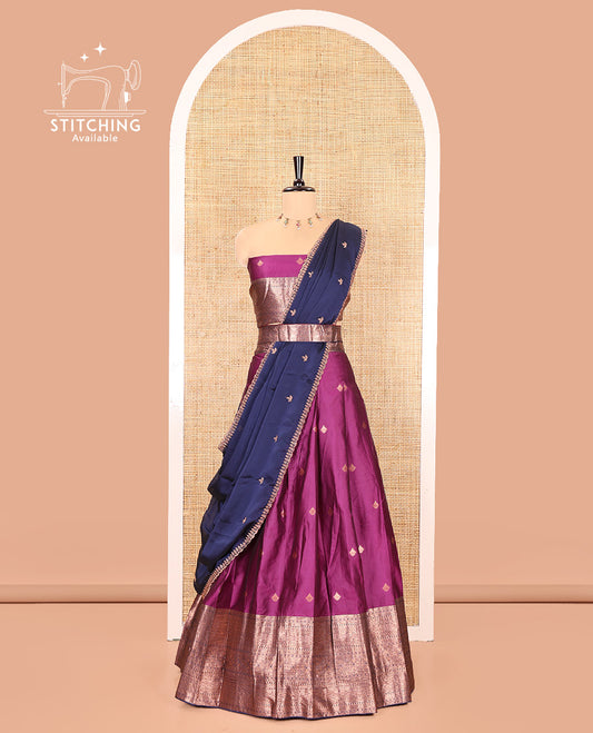 Purple and Navy Blue Semi-Banarasi Half-Saree, Bedecked with Zari Buttas on Its Skirt, Complemented by a Contrast Traditional Zari Designs Woven Border, Paired with a Matching Blouse, and a Contrast Satin Georgette Embroidered Scallop Dhavani
