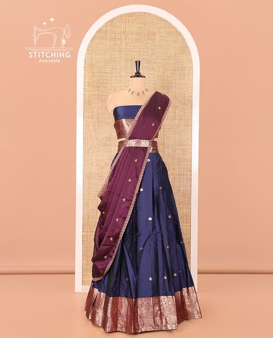 Blue and Purple Semi-Banarasi Half-Saree, Elevated with Zari Buttas on Its Skirt, Complemented by a Contrast Intricately Zari-Designed Border, Paired with a Matching Blouse, and a Contrast Satin Georgette Embroidered Scallop Dhavani