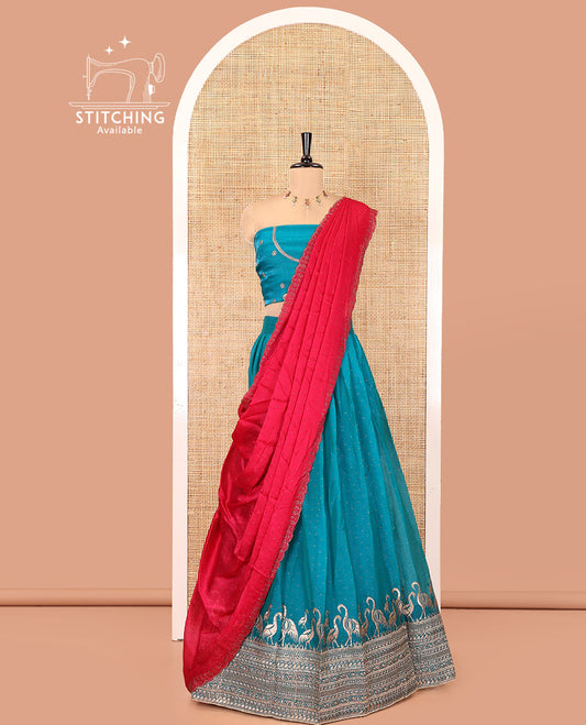 Rama Green Half-Saree Set, Gracefully Embellished with Stone Work and Bird Motifs Embroidery on Its Satin Georgette Skirt, Highlighted by Embroidered Border, Paired with a Matching Blouse, and Comes with a Contrast Scallop Stone Work Dupatta
