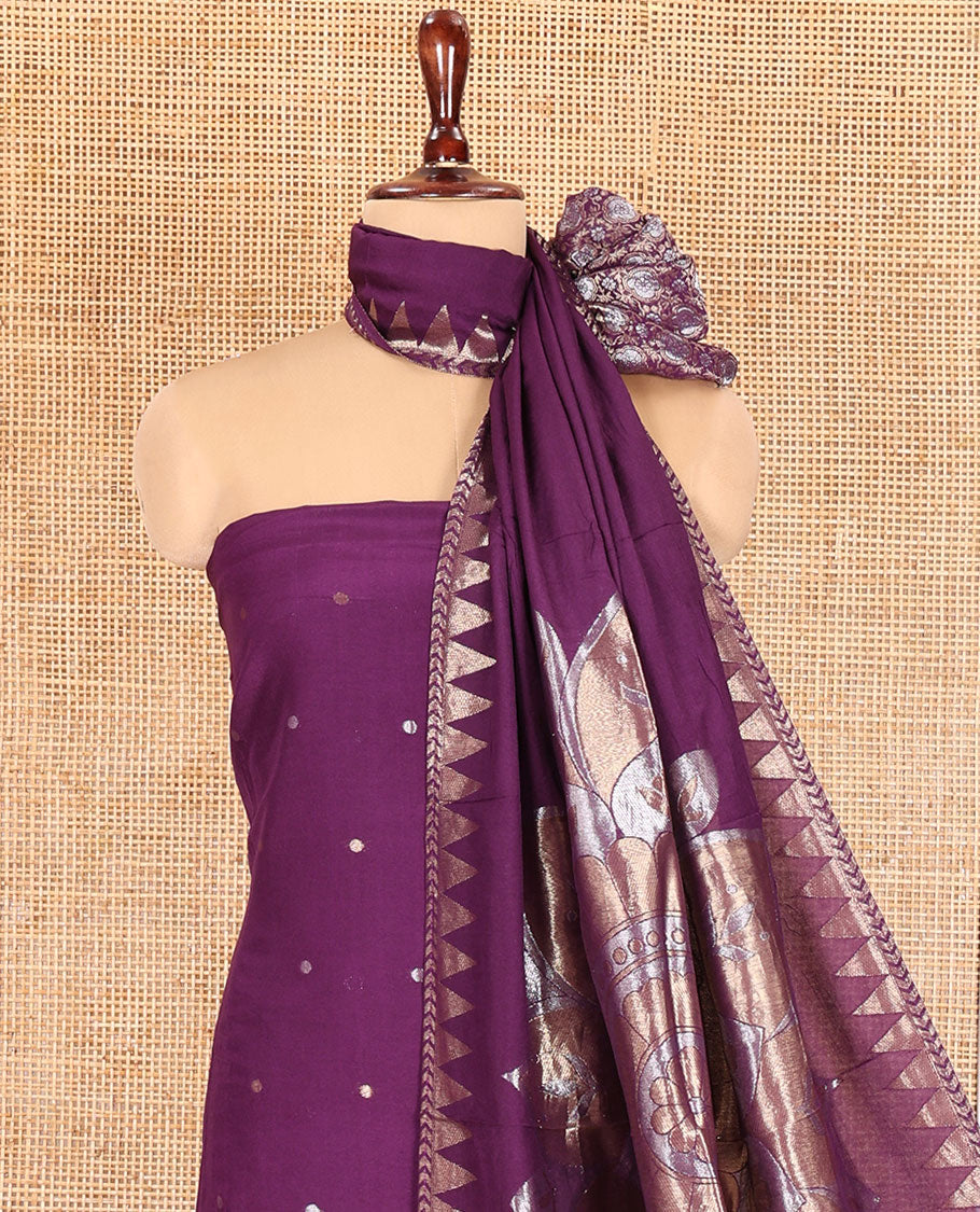 Dark Purple Semi-Silk Material Churidar Features Zari Buttas Skirt, a Plain Bottom, and a Floral Motif Zari Woven Dupatta