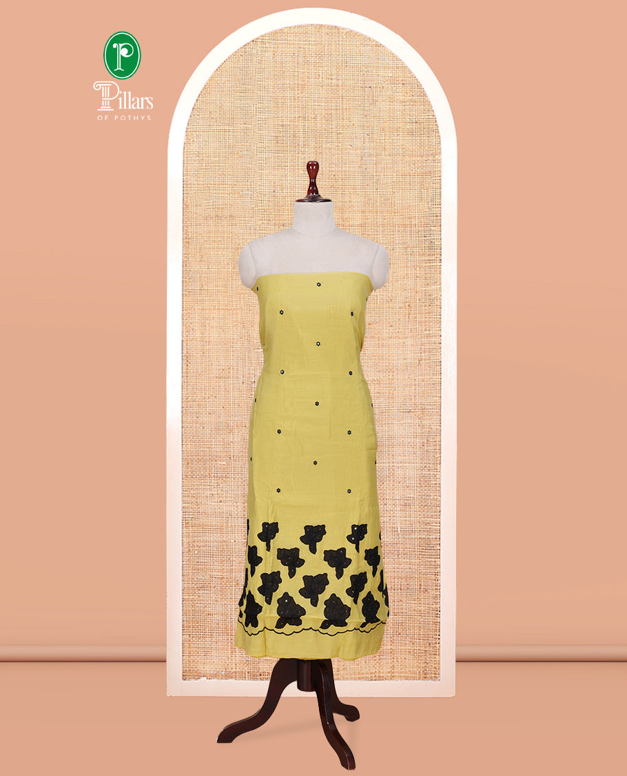 Lemon Yellow Mul Chanderi Material Churidar Features Floral Thread Embroidered Top, a Matching Bottom, and an Scallop Embroidered Dupatta