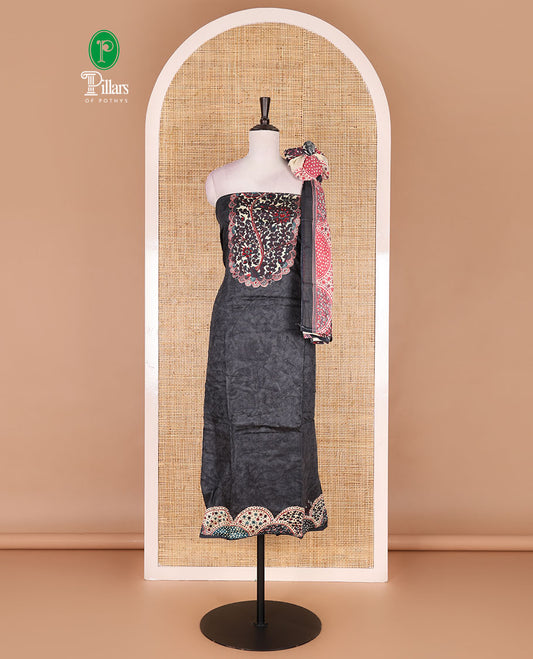 Dark grey pure cotton material chudidar set, floral print with French knot and bead work top, plain cotton bottom, and floral-geometric printed dupatta